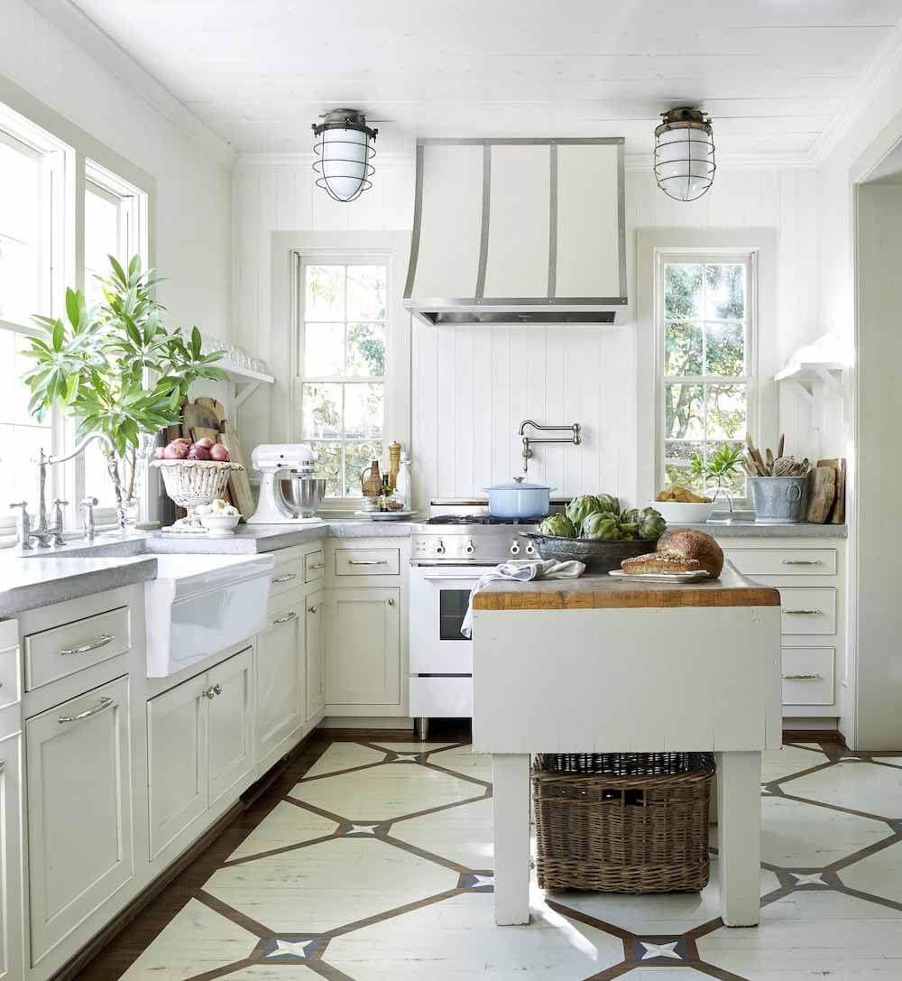 Heather is lucky enough to call this space home. The kitchen in her 1920s colonial home is bright, airy and packed with dreamy design details. Image: David Hillegas White kitchen in 1920s colonial home