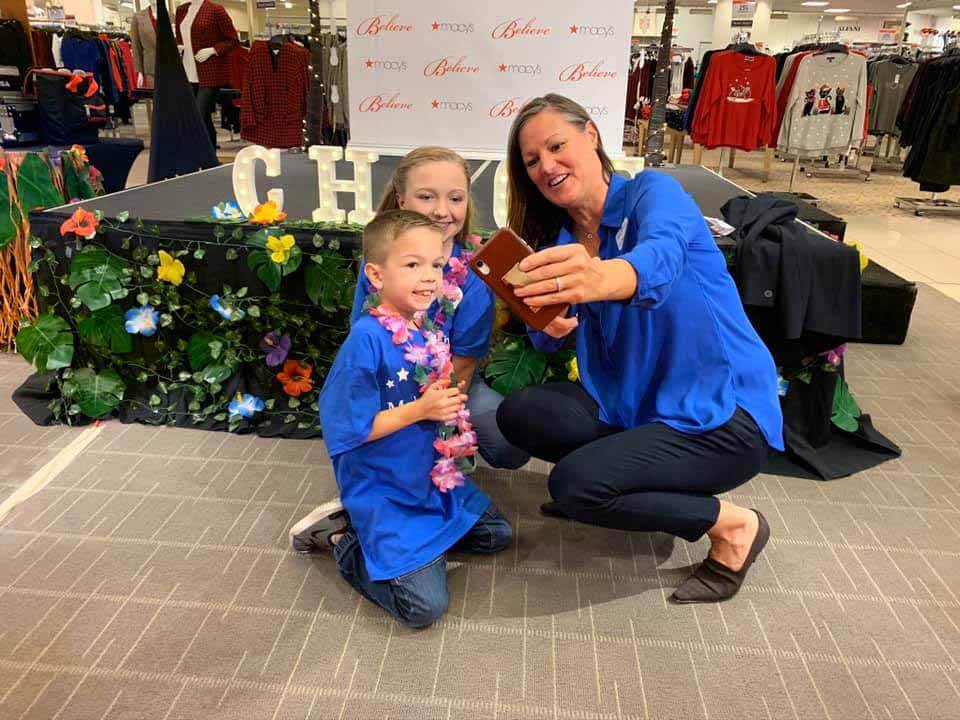 Tracy Bennett Smith taking a selfie with two children