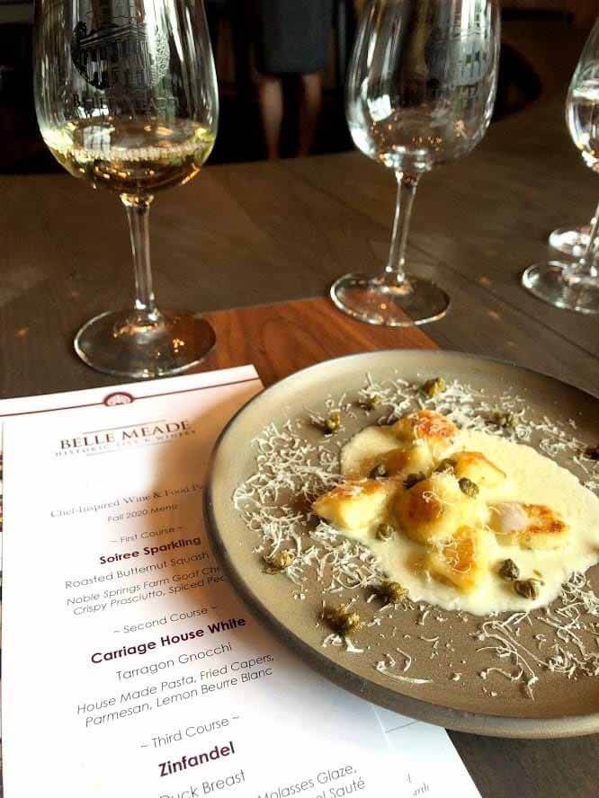 Menu, entrée and a glass of wine from Belle Meade Historic Site and Winery