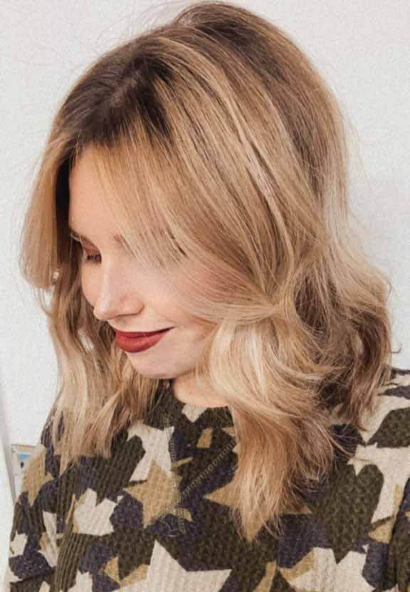 Brunette roots growing out in blond hair