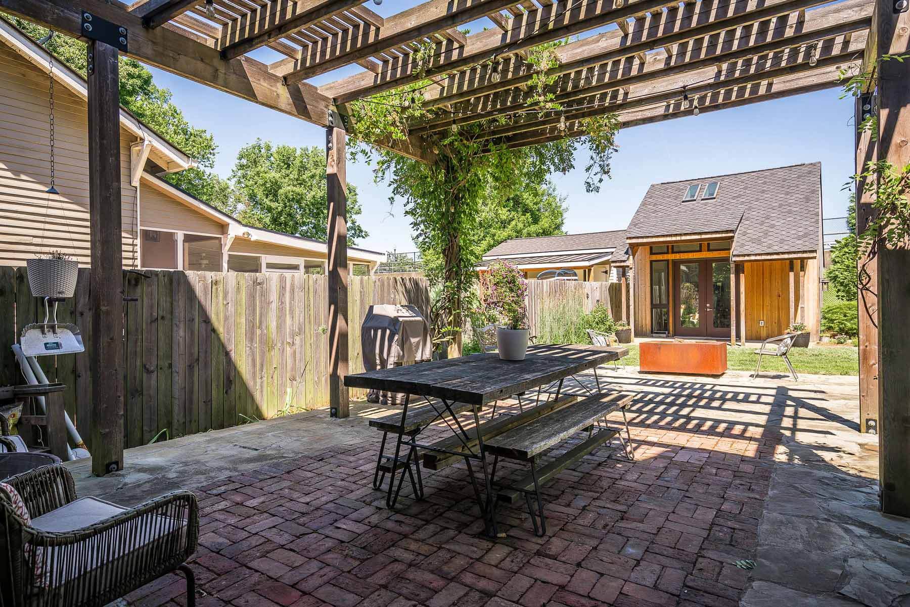 Pergola in custom-built Louisville home's backyard