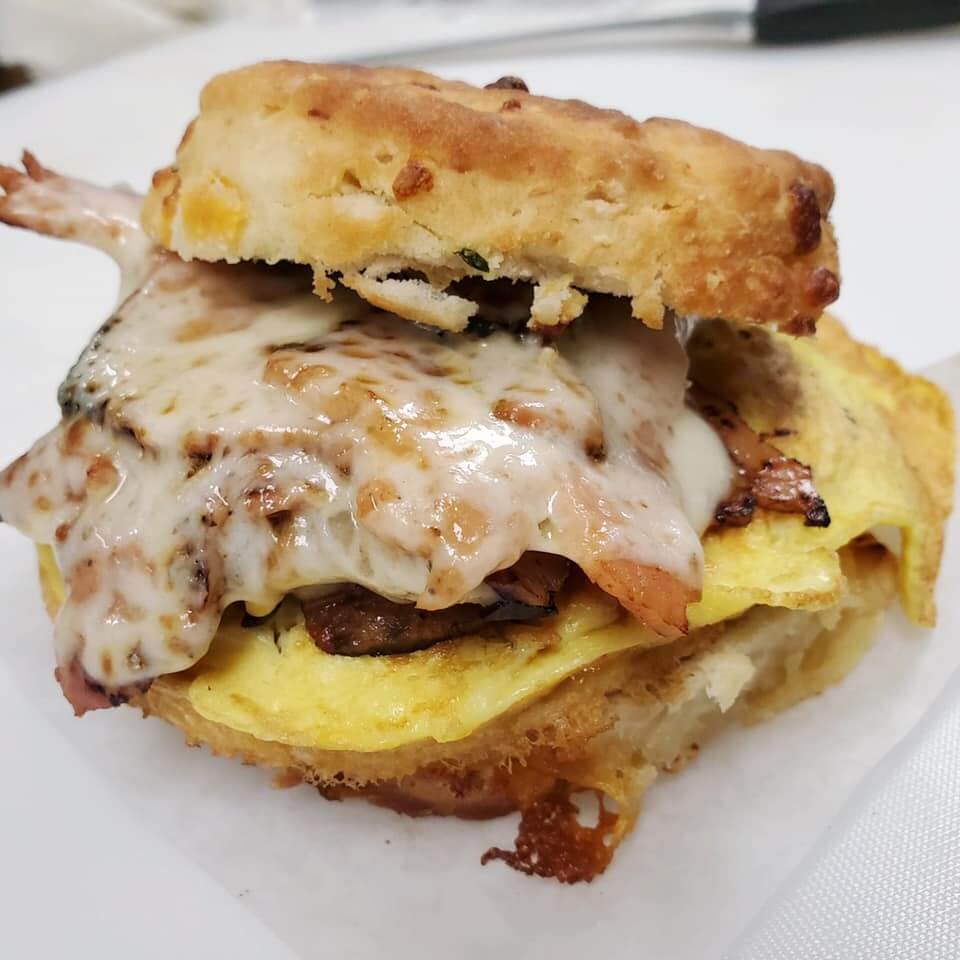 At Backlot, you build your own biscuit sandwiches. This delectable creation is root-beer glazed ham, egg, Provolone, and tomato jam on a cheddar-chive biscuit. Image: Backlot Sandwich Shop Biscuit sandwich from Backlot Sandwich Shop, a new Memphis restaurant