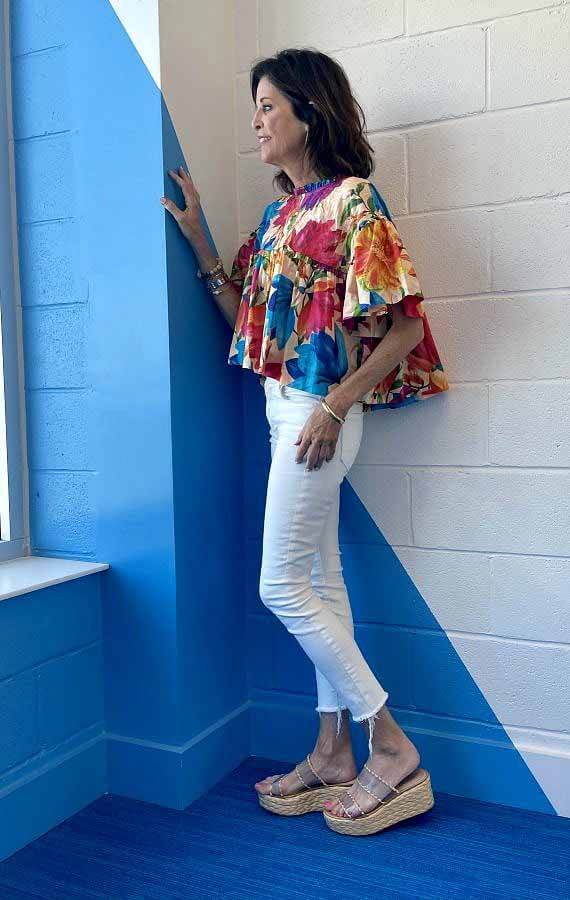 Cynthia Kelley white jeans and full top