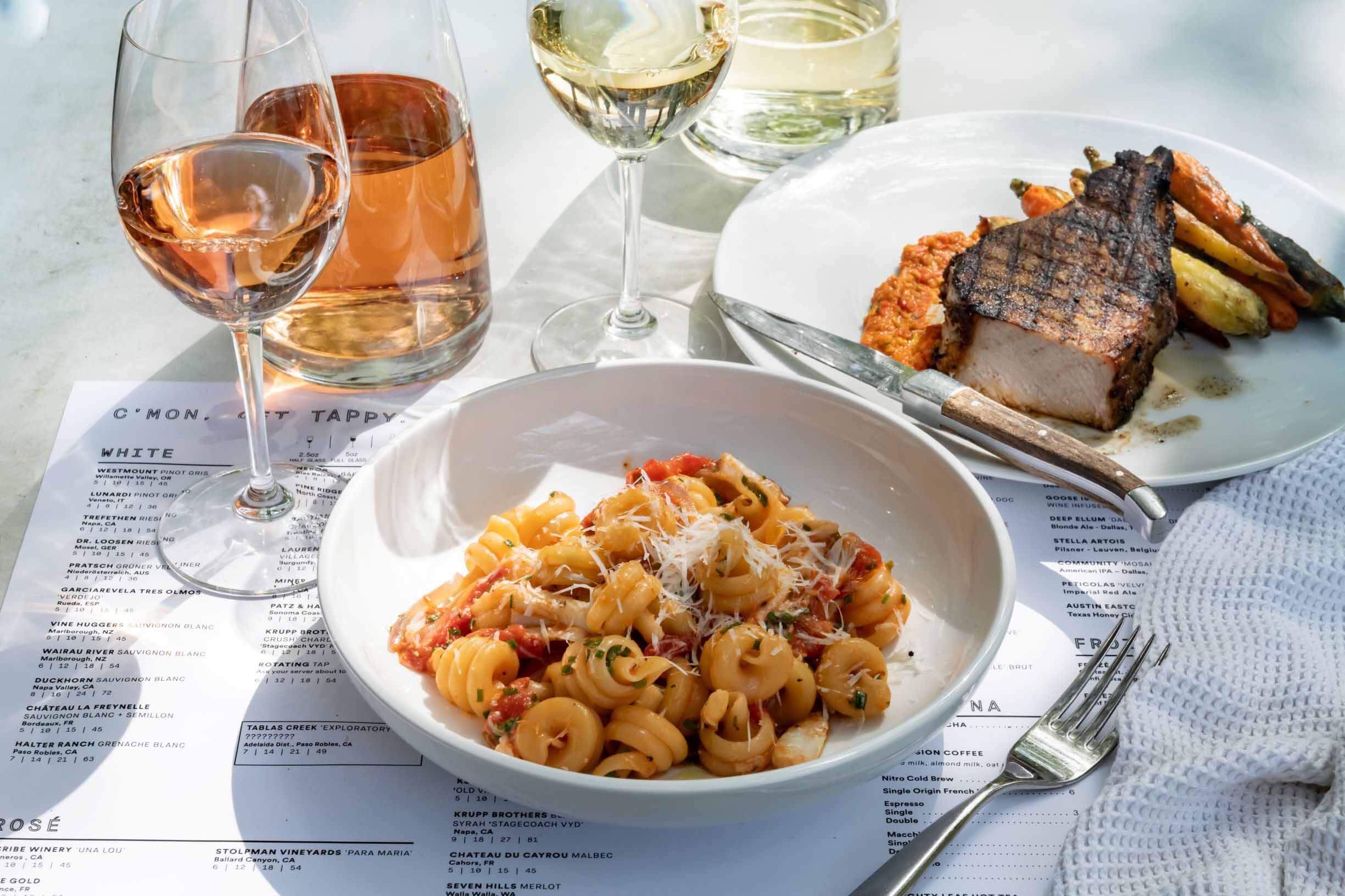 The Campanelle pasta, and the pork chop with peppadew romesco from Sixty Vines | Image: Manny Rodriguez Food and wine selections from Sixty Vines such as rosé and pasta