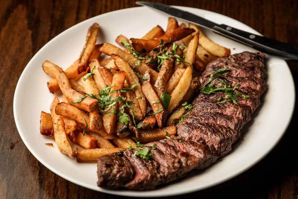 This butcher's steak and fries is a midday treat for lunch. Steak and fries from Grilled on Main