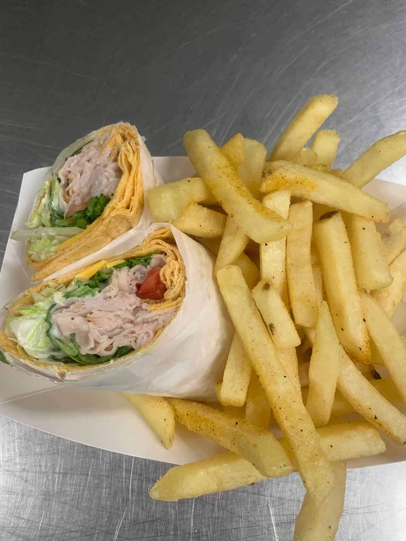 ...And now we're hungry. How's this for a wrap? Image: Fabiola's Kitchen Wrap and fries from Fabiola's Kitchen