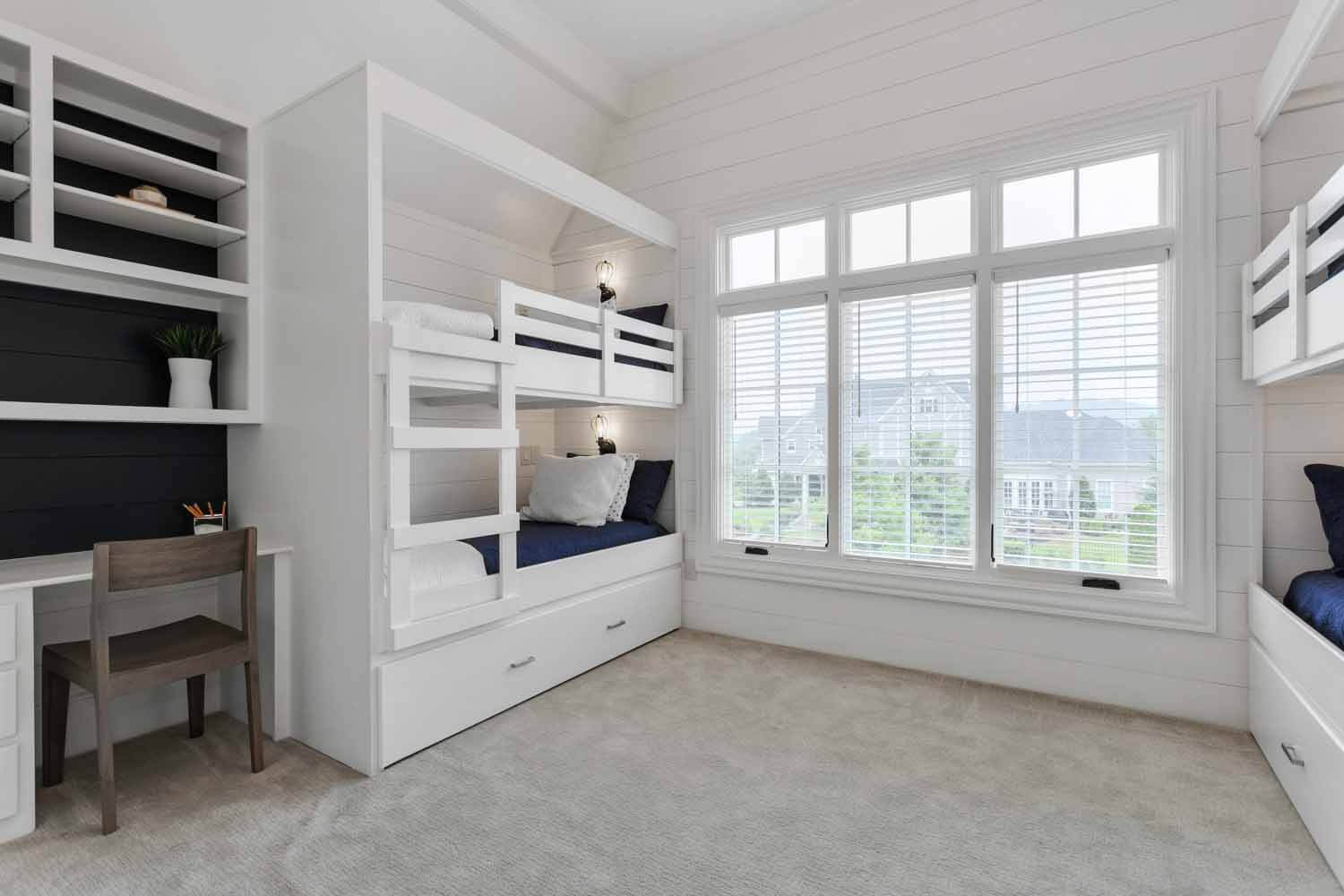 Children's bedroom with two sets on bunk beds