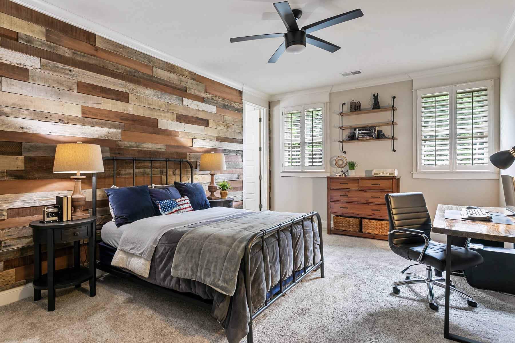 Second-floor bedroom with wood accent wall