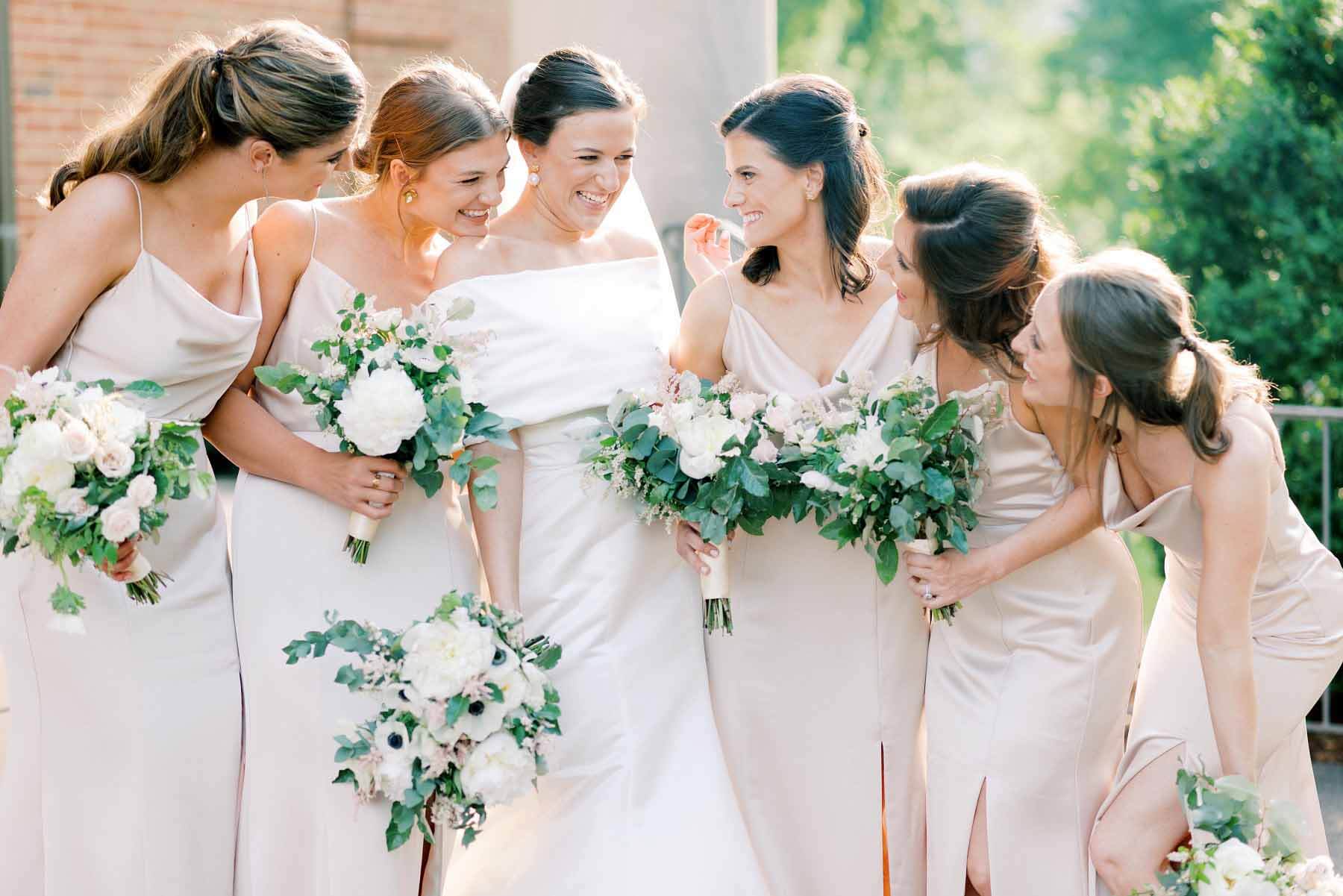 Alli and her bridesmaids laughing