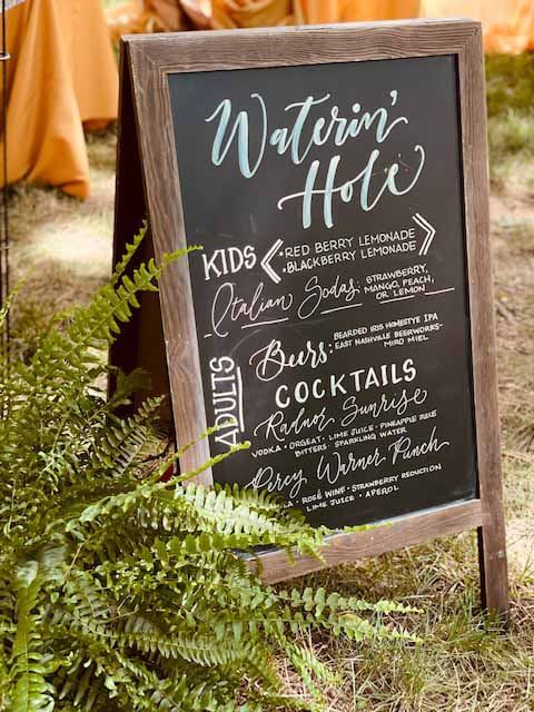 "Waterin' Hole" chalkboard sign for cocktails and mocktails