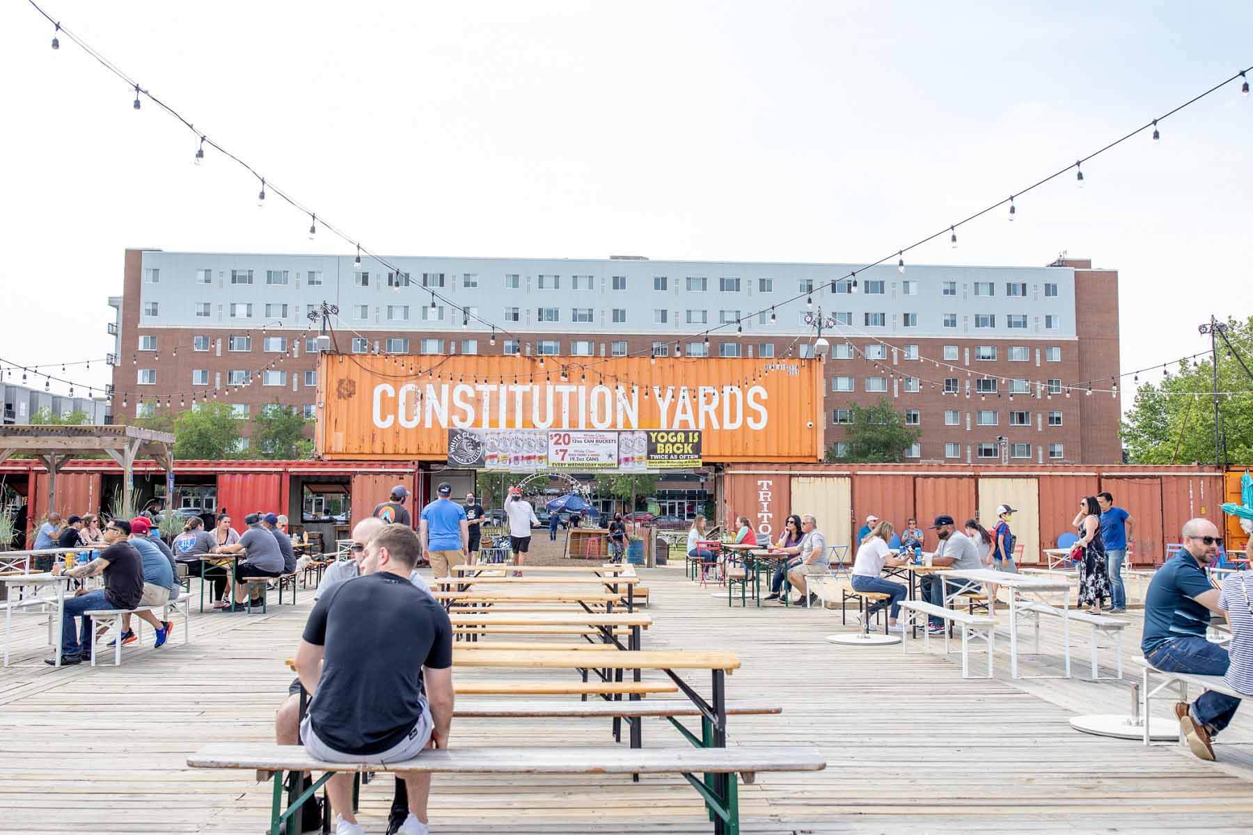 Patio with picnic tables at Constitution Yards