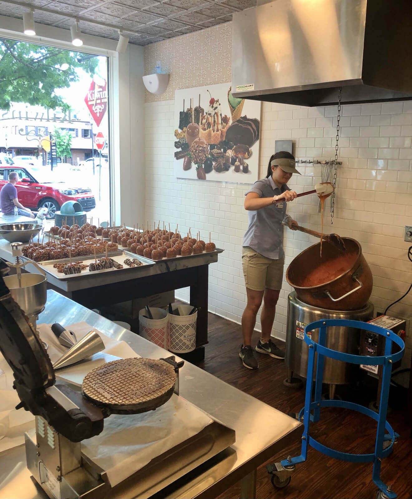 Woman making sweets at Kilwins