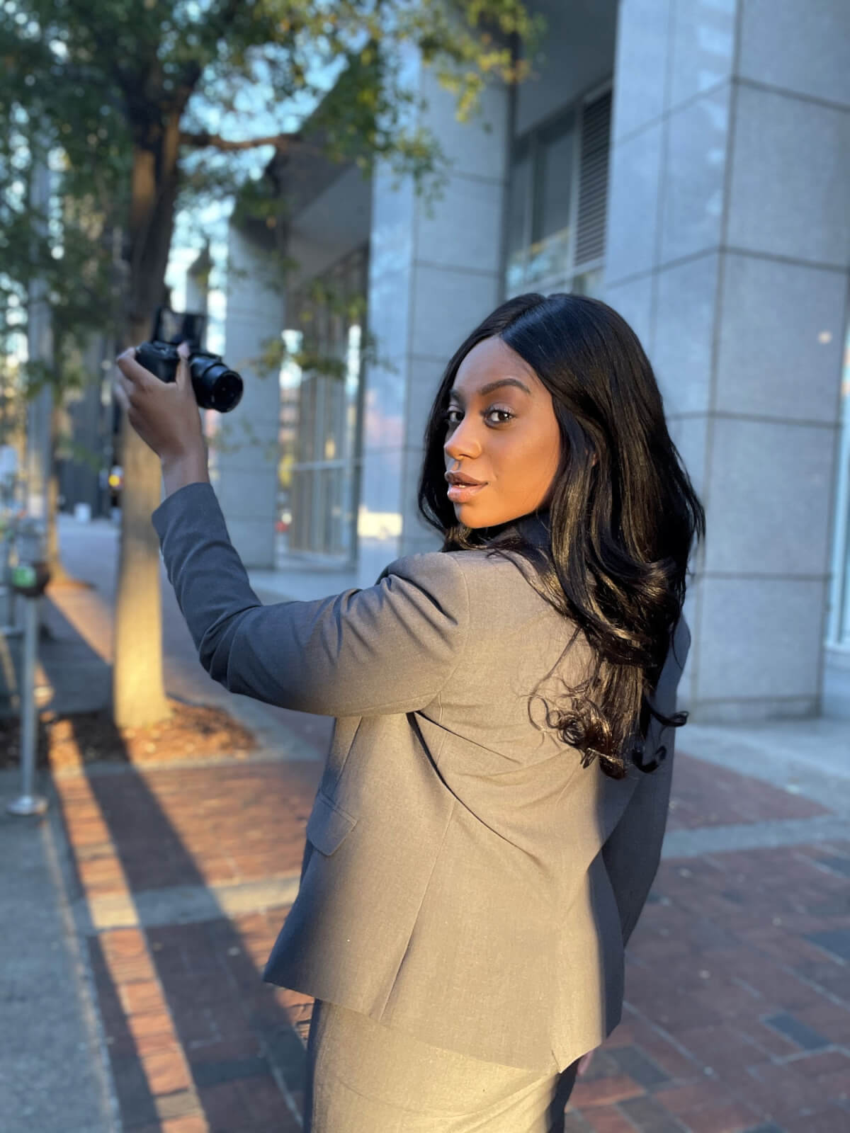 Birmingham influence taking a selfie on the street