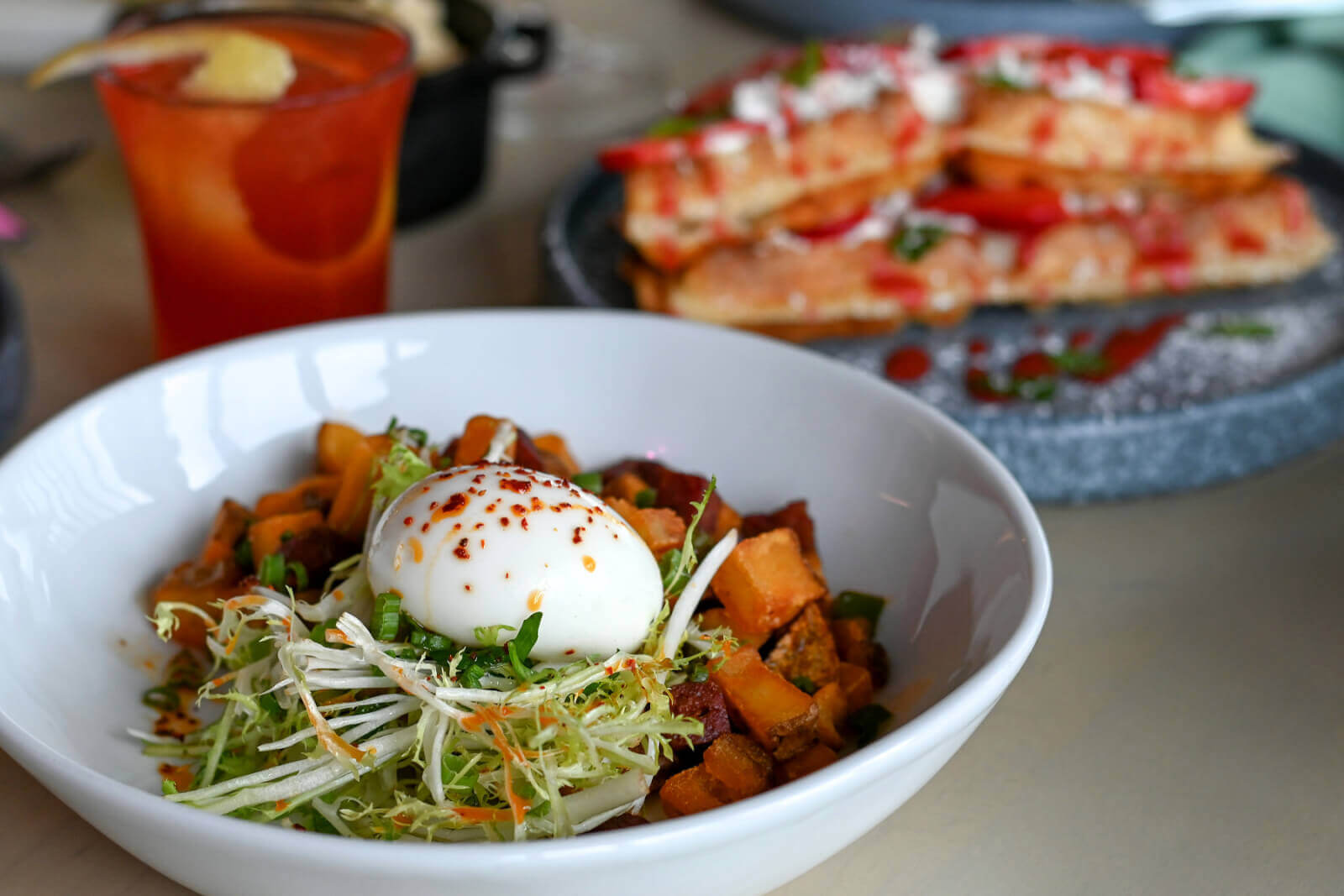 From the quintessential Zeppelin Breakfast to waffles topped with strawberries and whipped cream, you can't go wrong with any item you choose from Zeppelin's new brunch menu. Image: Zeppelin Brunch dishes from Zeppelin