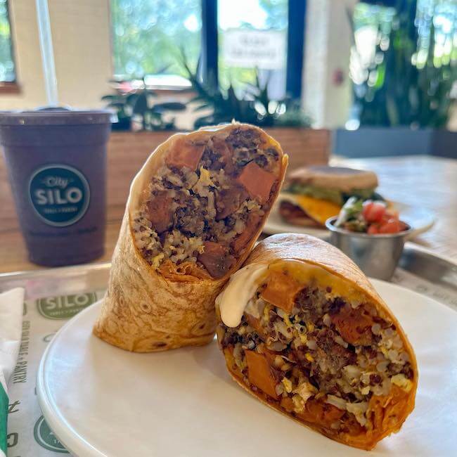 Enjoy a Sunshine Burrito at City Silo Table + Pantry! Image: Facebook Burrito filled with rice, beans, and meat