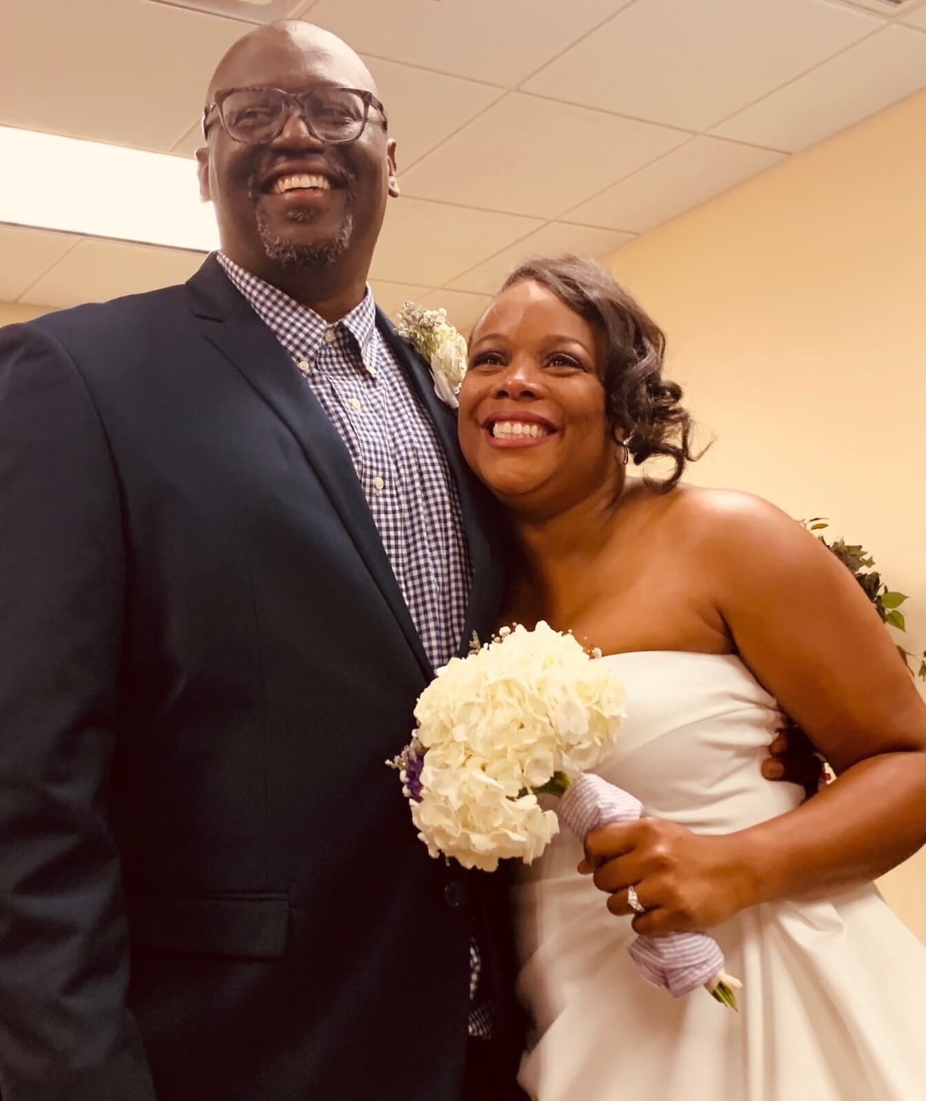 Dacquiri Baptiste and her husband at their wedding