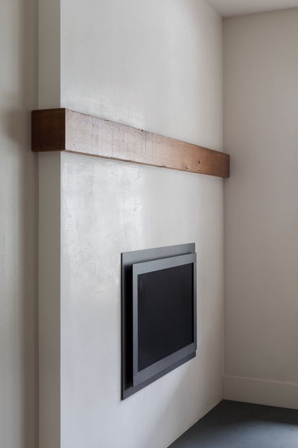 Fireplace with cedar beam mantel