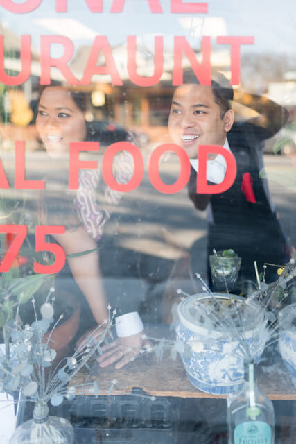 Anna Myint posing in front of the International Market