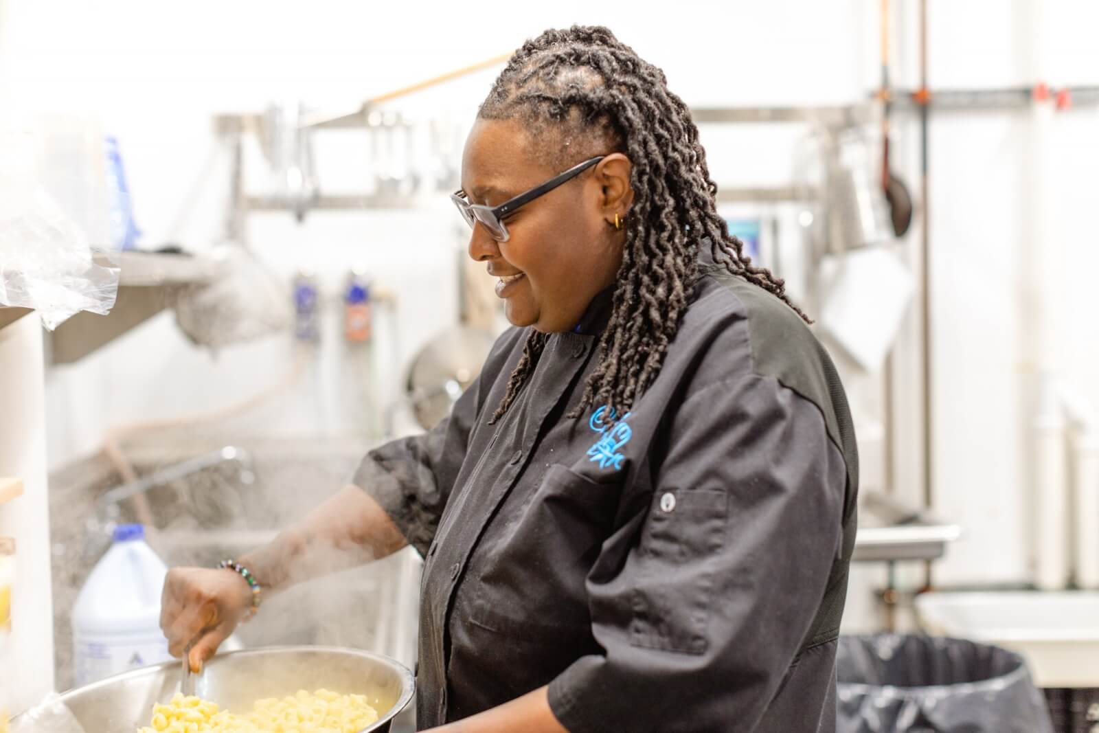 Star Maye in the Anzie Blue kitchen, cooking.