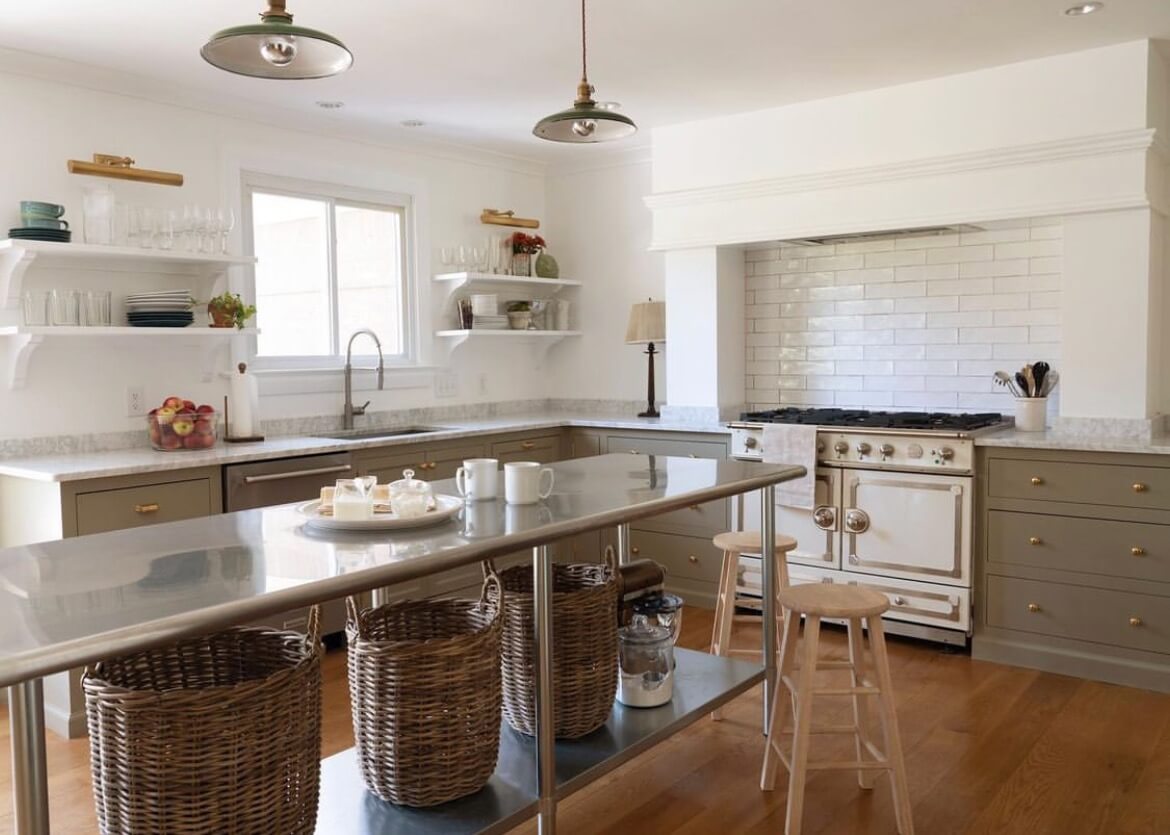 Kitchen with steel center island and lots of counter space that was renovated by Lone Oak Builders
