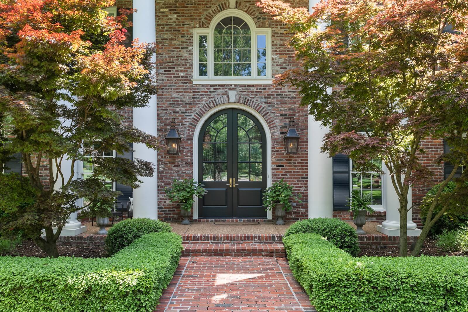 Arched French doors at entry of 5325 Cherry Blossom Trail in Nashville, TN