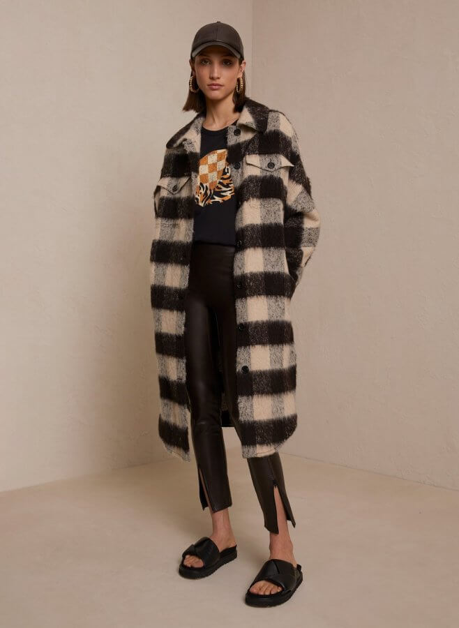Woman in Longline Plaid Coat