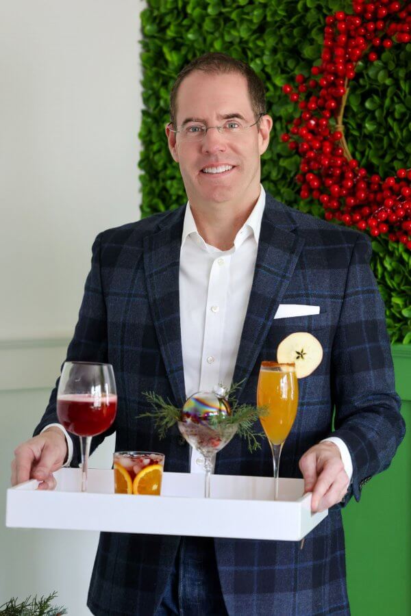 Amos Gott and four champagne cocktails
