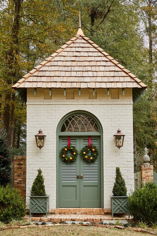 Boxwood wreaths on the doors of a pigeonnier at Farmdale.