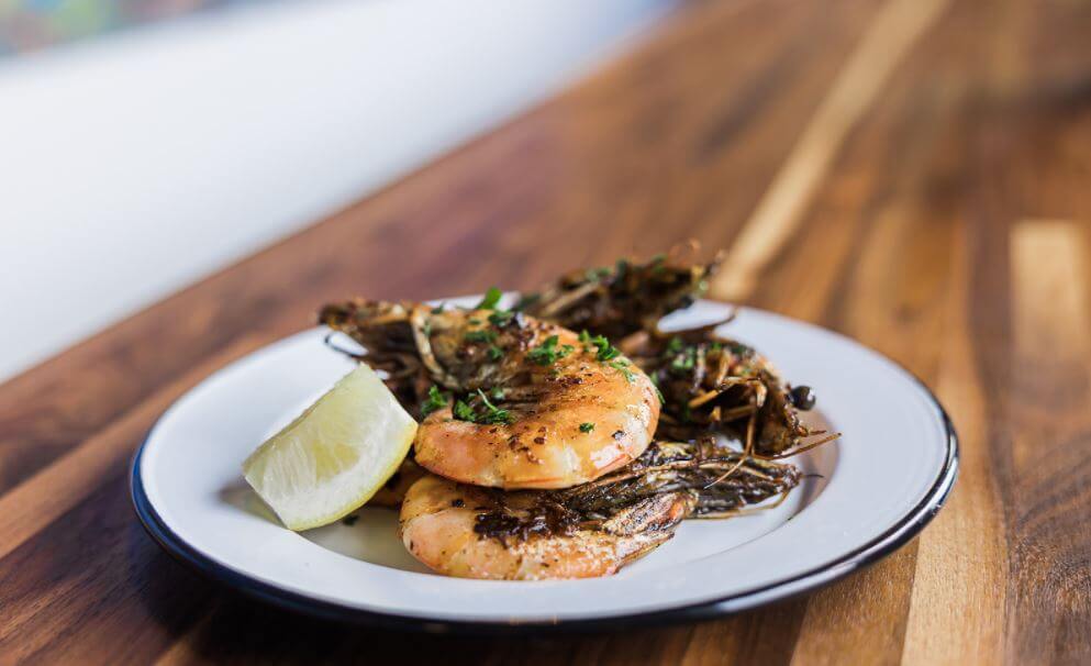 Seafood-centric Red Perch is open at Sylvan Supply! Image: Eli Greiss Shrimp dish at Red Perch