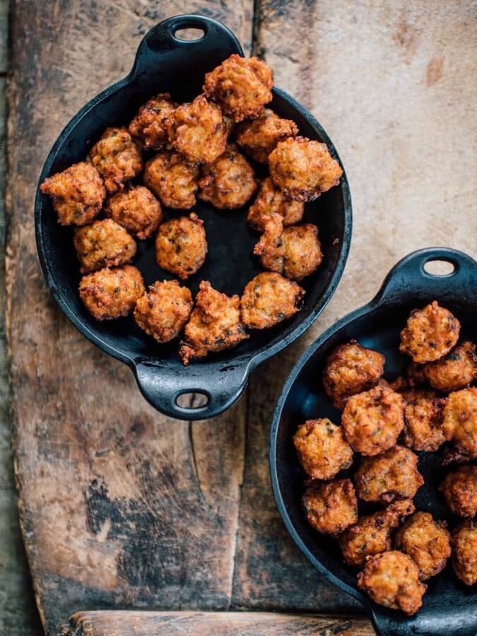 8 Cozy, Cajun-Inspired Recipes for Fat Tuesday - 2 Shrimp boulettes cast-iron skillets