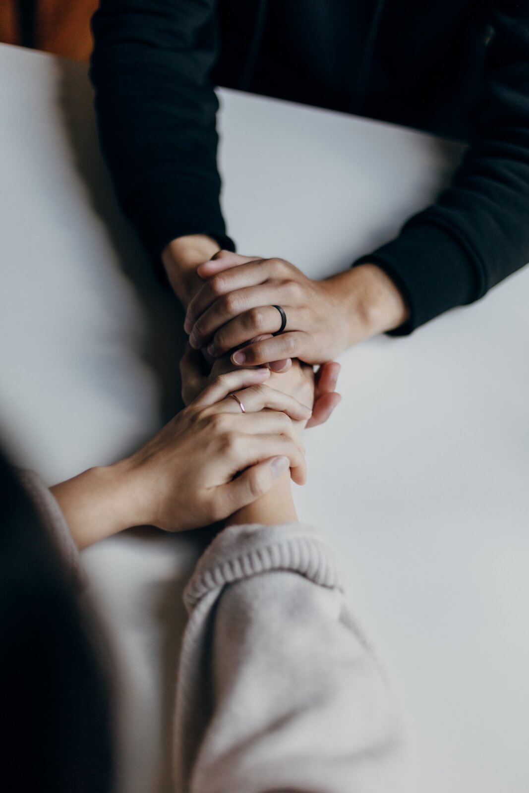 Women holding hands