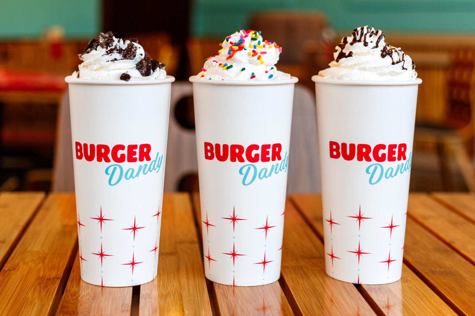 Burgers and cheese fries and milkshakes, oh my! Burger Dandy definitely delivers the goods. Image: ©Amy Whidby A trio of spiked shakes from Burger Dandy