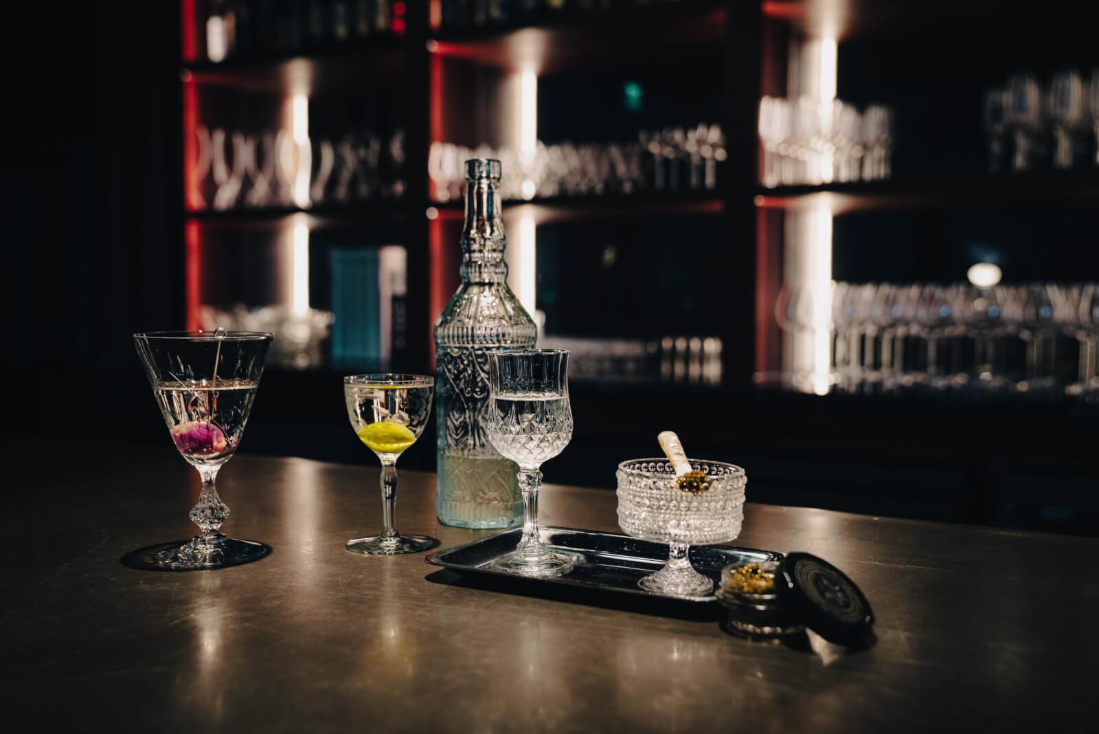 Brooding and beautiful, The Vesper Club brings an exquisite martini and caviar pairing to The Continental. Image: Sean McGee Martinis and caviar at The Vesper Club