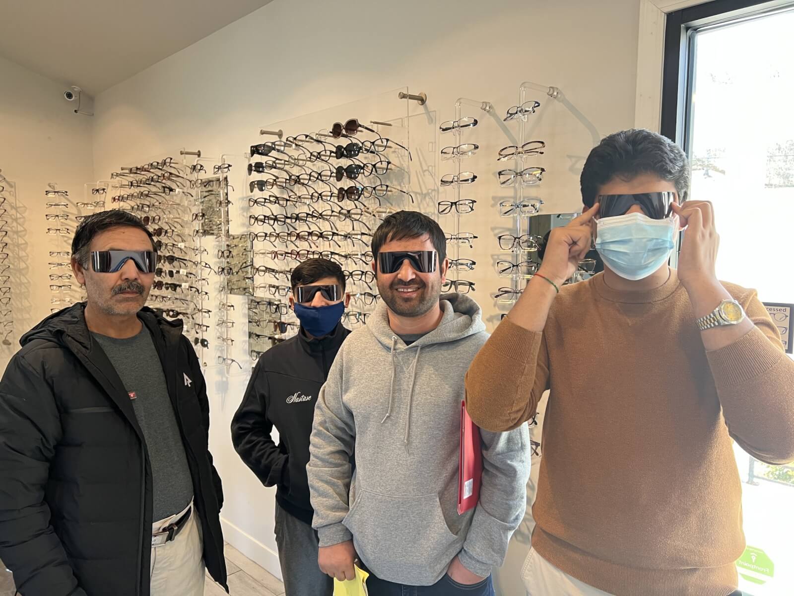 Family receiving vision care from Tennessee Resettlement Aid