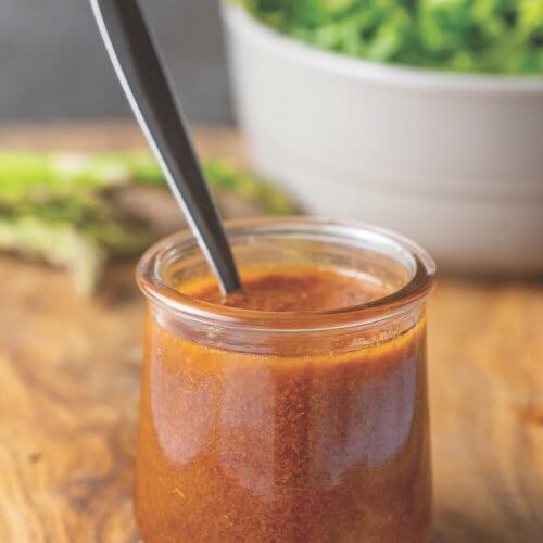 Jar of sun-dried tomato salad dressing