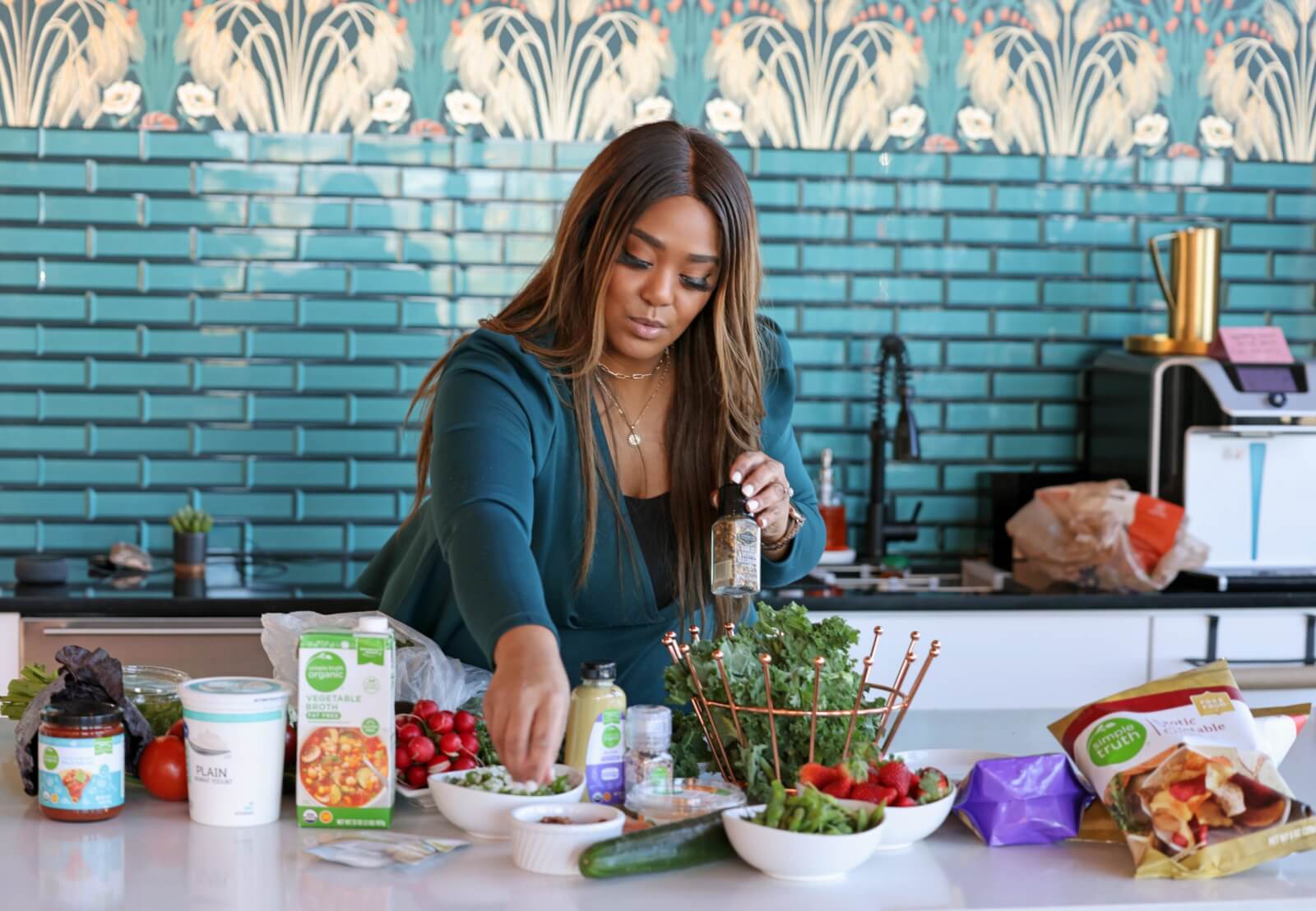 Kirbee Miller preparing a dish.