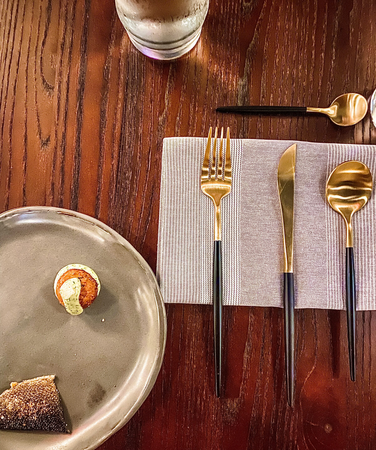 An amuse-bouche at Acqua, with a side of beautiful silverware. Image: Kate Reddick An amuse bouche at Acqua, with a side of beautiful silverware.
