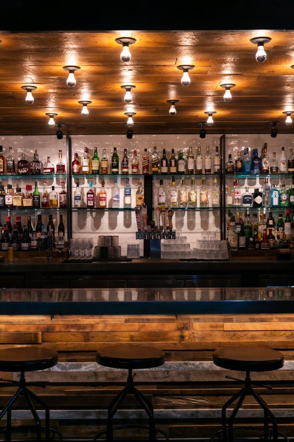 Moody lighting and fabulous food make for an exciting dining experience at Bobby Hotel's Union Tavern. Image: Lisa Diederich Interior of the Union Tavern Bar