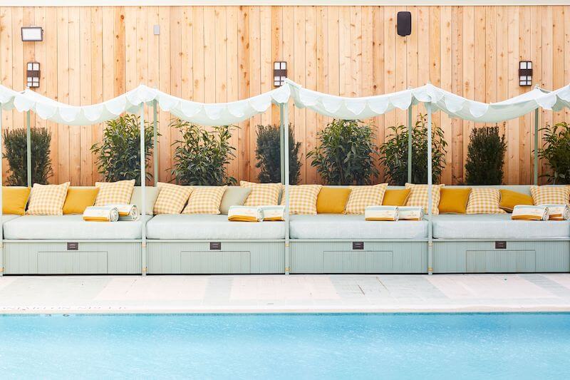 Pool area and cabanas at Soho House Nashville.