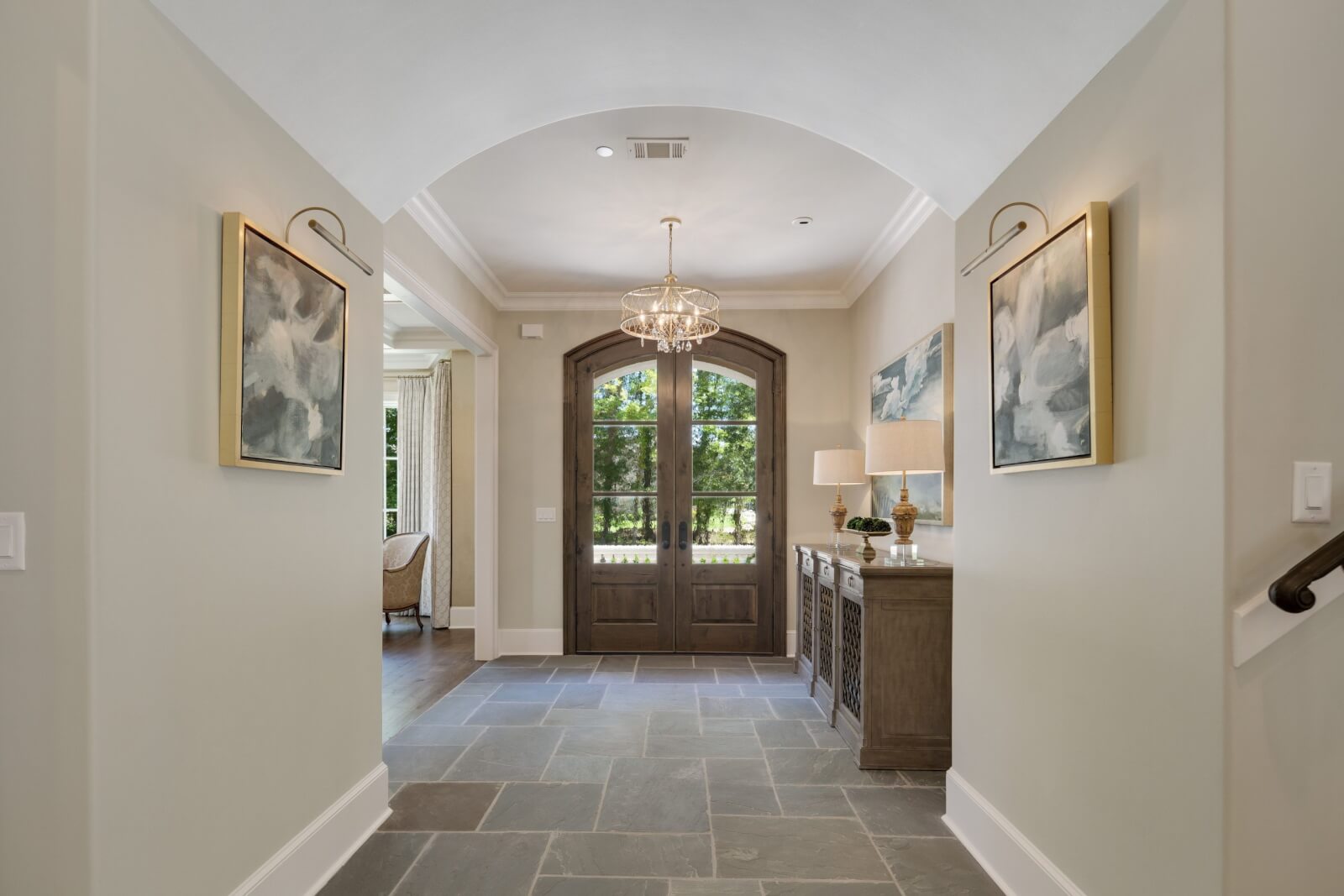 Entryway with custom home lighting