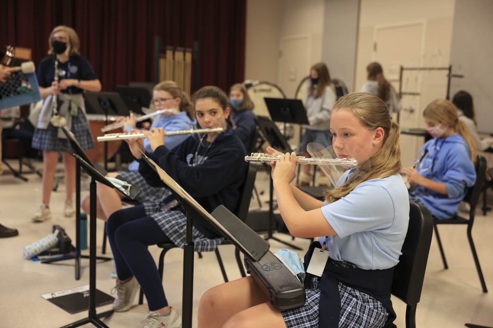Girls playing instruments in the band at St. Mary's