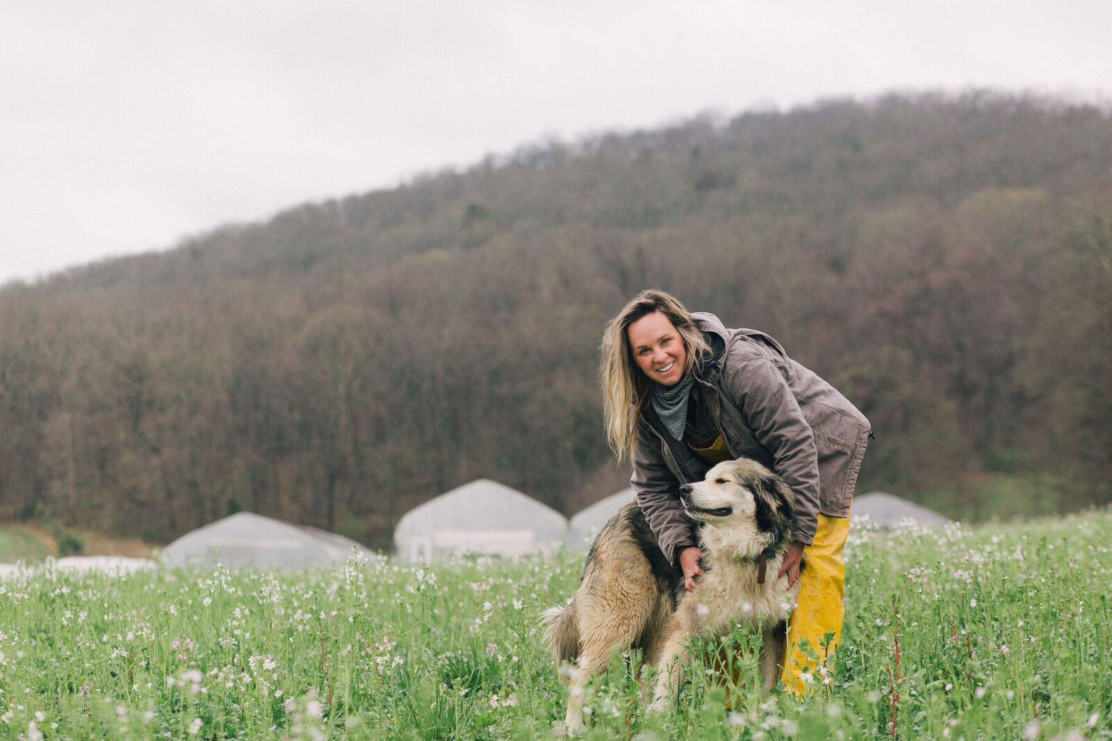 Lauren and her dog in the field at Bloomsbury Farm