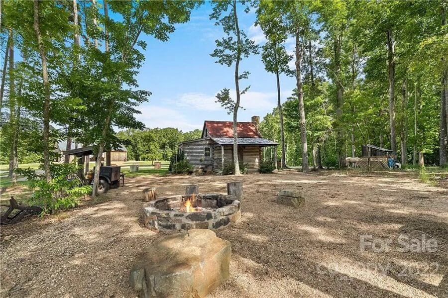 Fire pit and cabin at Blacksburg SC Property For Sale