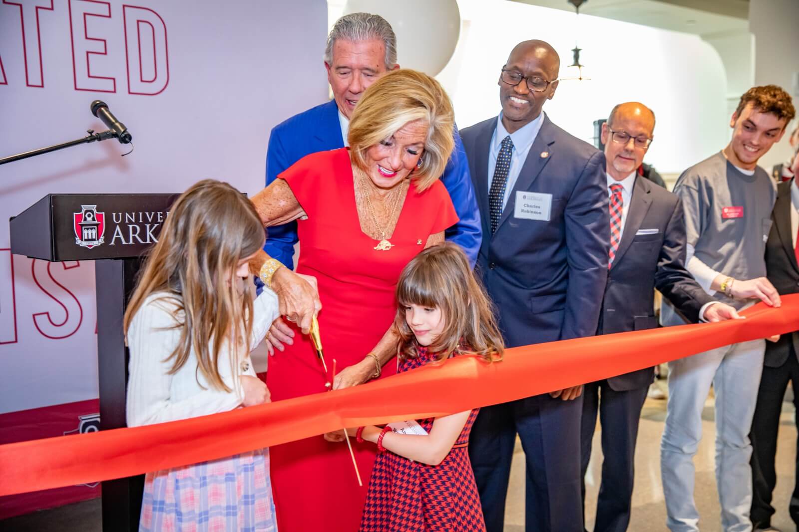Cordia at a ribbon cutting for the University of Arkansas.