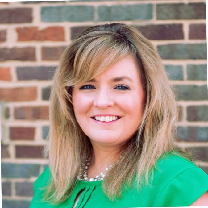 Rachael Finch in a green blouse