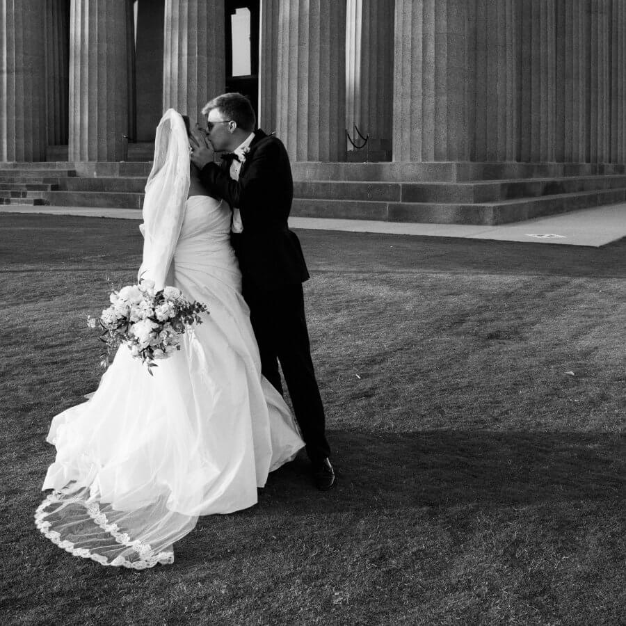 Maggie and Kevin share a kiss outside of The Parthenon.