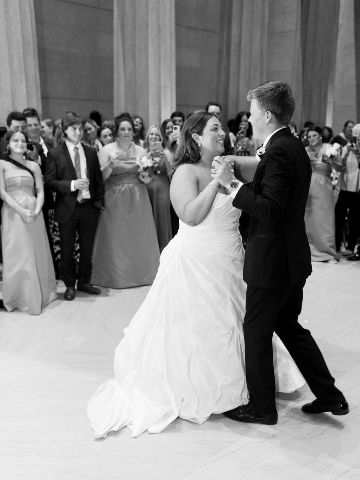 The bride and groom share their first dance at their Parthenon wedding