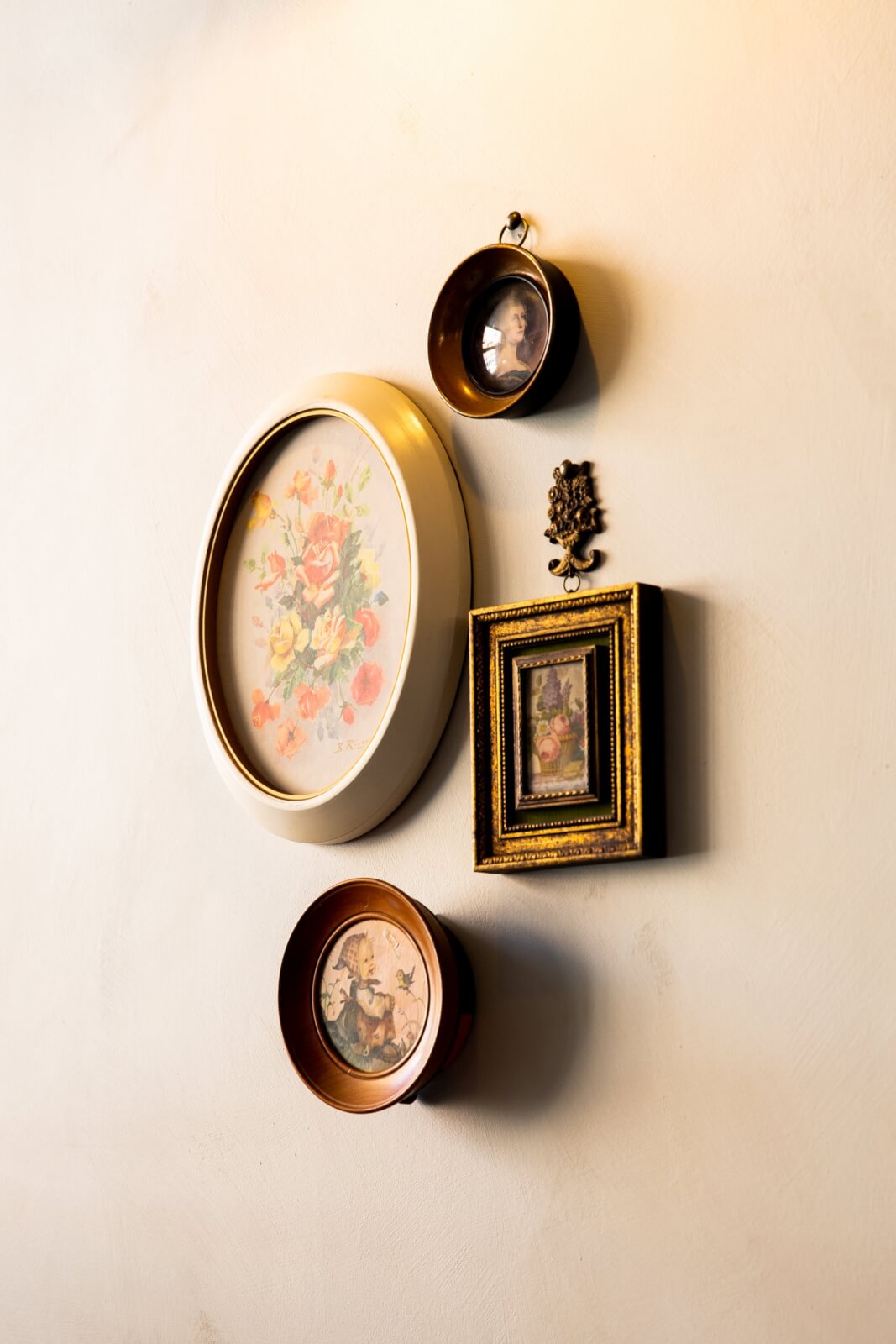 Close-up of vintage antiques hanging on restaurant wall