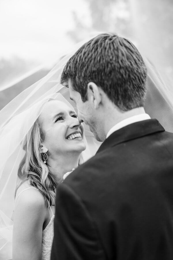The bride and groom share an intimate moment.