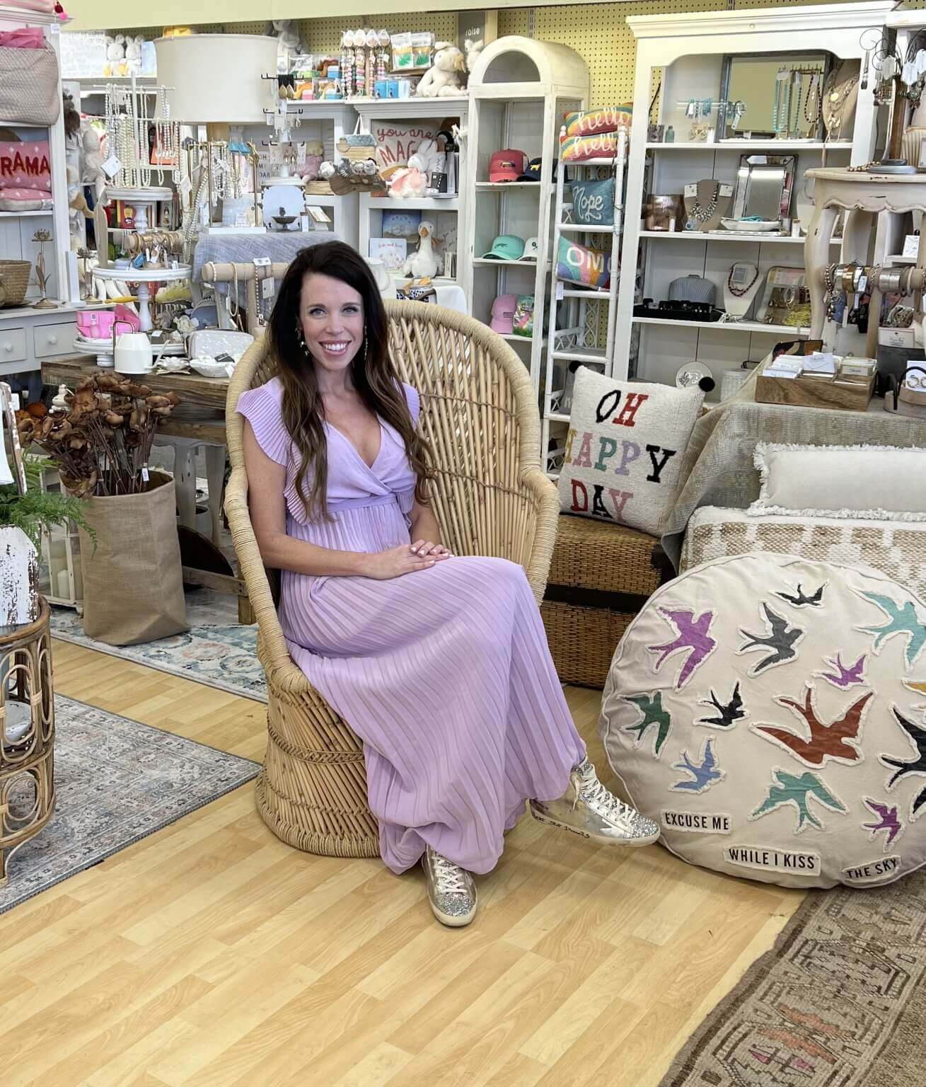 Amanda Bailey Leach sitting on chair at Crestline Pharmacy 